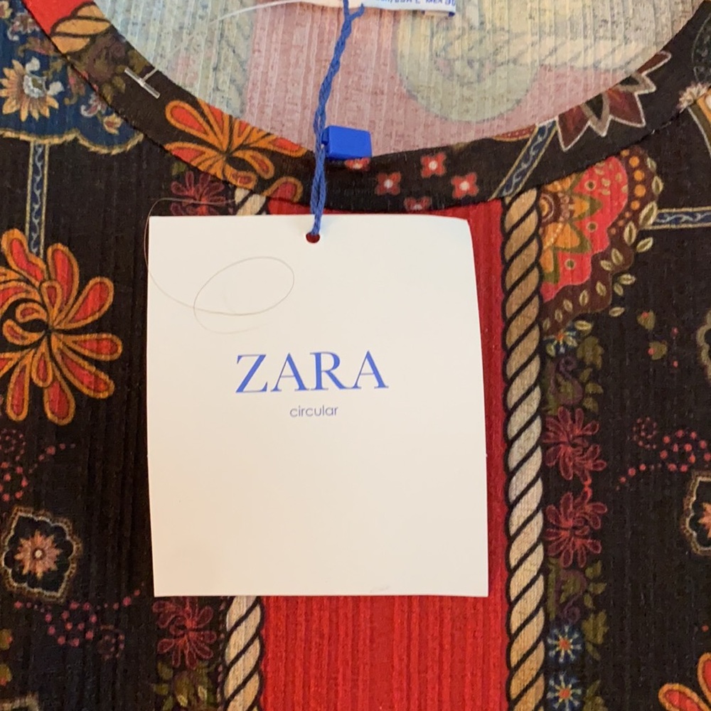 Zara Crinkle Peplum top